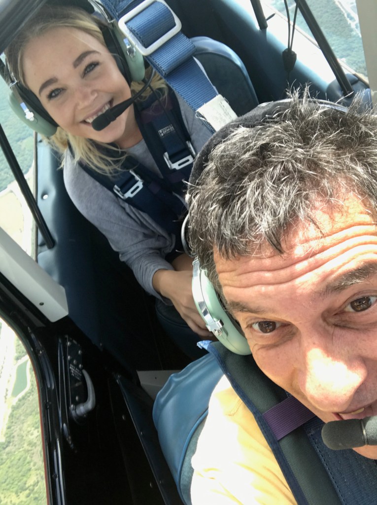 Book an aerobatic flight near Sarasota and learn to roll a plane!